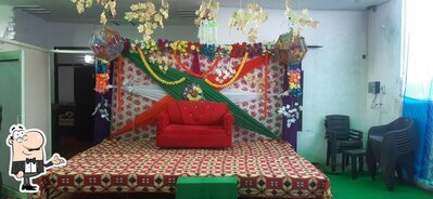 Take a seat at one of the tables at Green Haveli