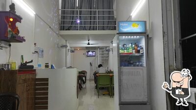 Take a seat at one of the tables at Tasty Plus Chinese Restaurant