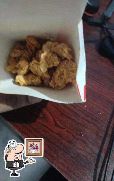 Take a seat at one of the tables at KFC