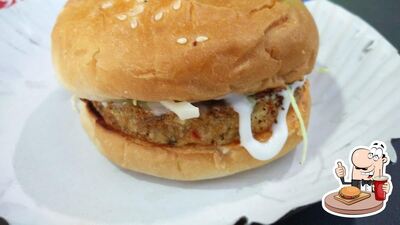 Order one of the burgers available at 22g's food point
