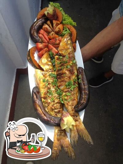 Experimente diversos refeições de frutos do mar disponíveis no Restaurante O Caiçara