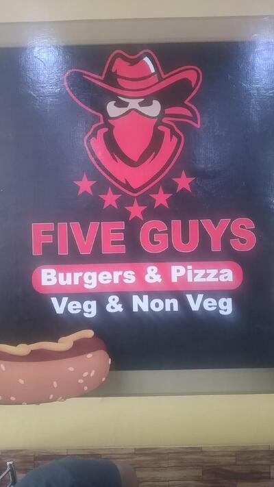The advertisement displays information about Five Guys