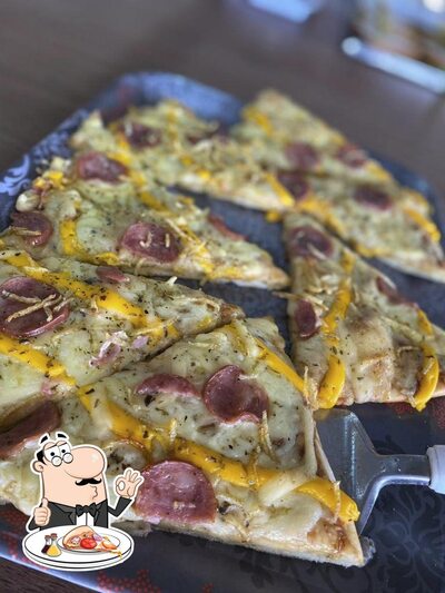 No Panificadora e Lanchonete Gênesis, você pode provar pizza