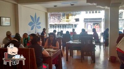 Take a seat at one of the tables at The Blue Lotus