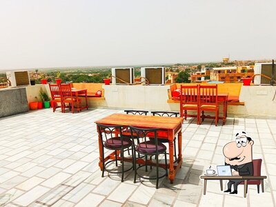 Take a seat at one of the tables at Sakura restaurant