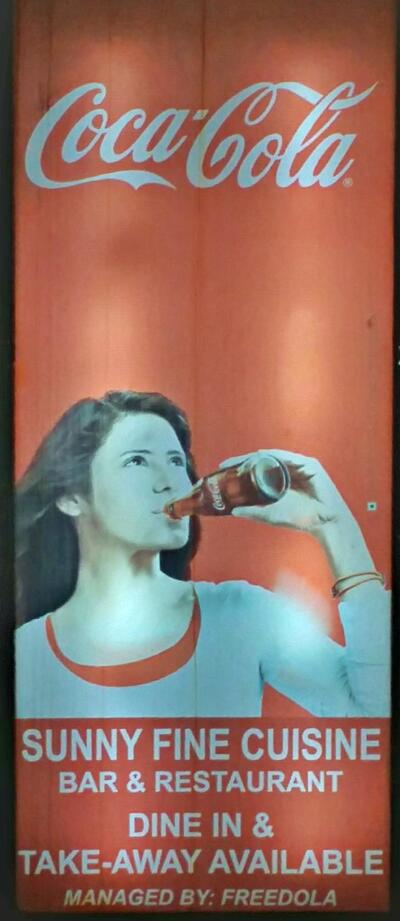 The advertisement displays information about Sunny Bar
