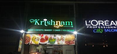 The advertisement displays information about New Krishnam