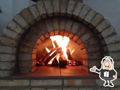 Veja imagens do interior do Praiano's Pizza