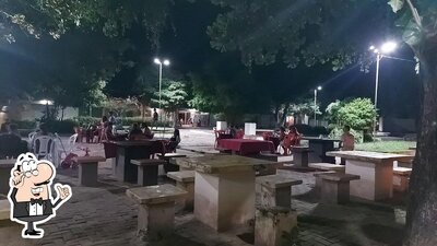 O interior do DOM PIZZA