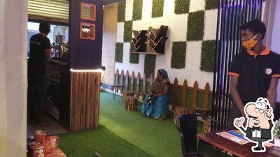 Take a seat at one of the tables at Safar - The Cafe