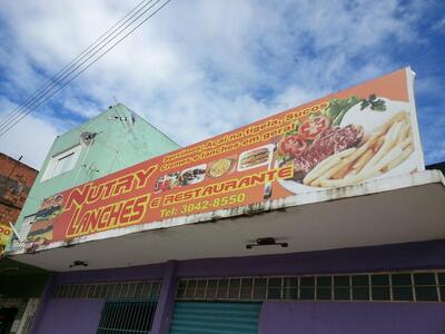 A publicidade apresenta informações sobre o Nutry Lanches e Restaurante