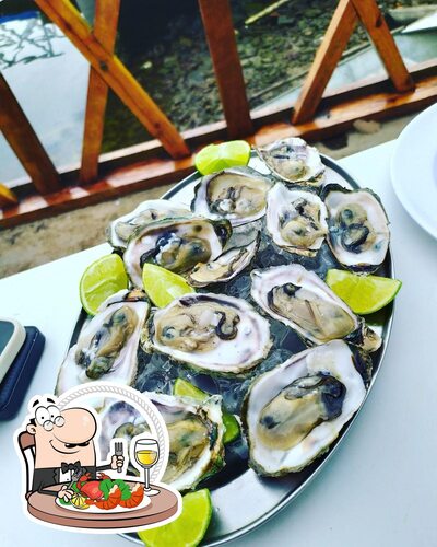 Lanchonete E Restaurante Sol E Mar Ariri serve uma infinidade de pratos de frutos do mar