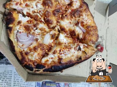 Pick pizza at delicious Pahadi Pizza