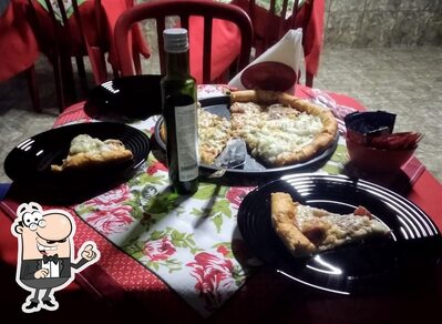 O interior do Dalva delivery pizzaria lancheteria quitandaria lmtd