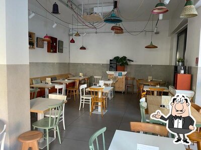 Siediti a un tavolo di Alma Buona -naturalmente Pizza-