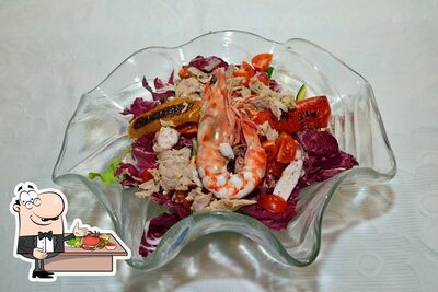Assaggia i sapori della cucina di mare al ristorante Albergo RISTO' Italia