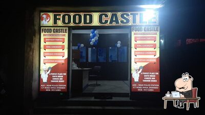 Take a seat at one of the tables at Food Castel