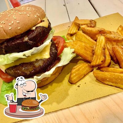 Prova uno dei tipi di hamburger disponibili al pub & bar Caffè Milano Riccione