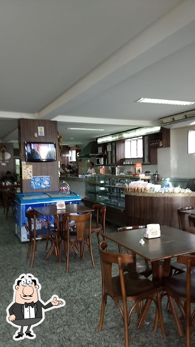 Sente em uma das mesas no Padaria Barra Pão Ltda EPP