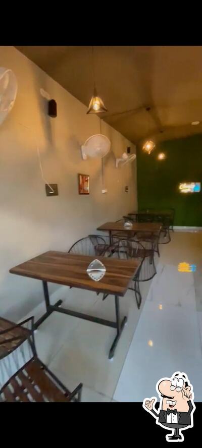 Take a seat at one of the tables at Ananta Cafe