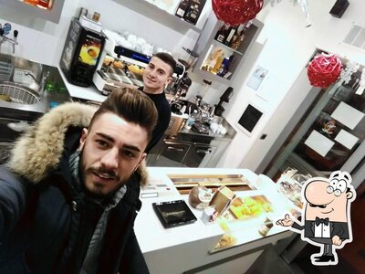 Siediti a un tavolo di Ganesh Caffé