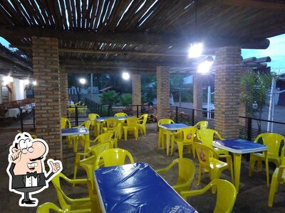 Sente em uma das mesas no Restaurante Peixão