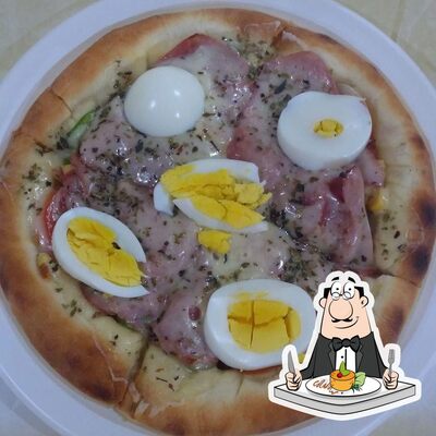Comida em Pizzaria Suprema