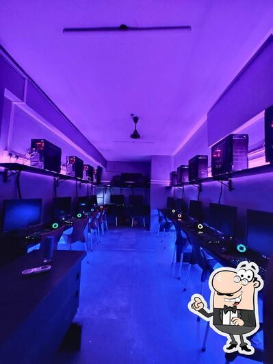 Take a seat at one of the tables at Level Up Gaming Cafe