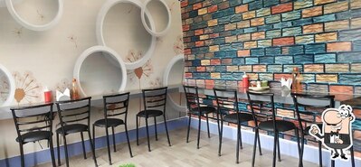 Take a seat at one of the tables at Food junction