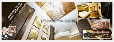Take a seat at one of the tables at Hotel Atrium Erode