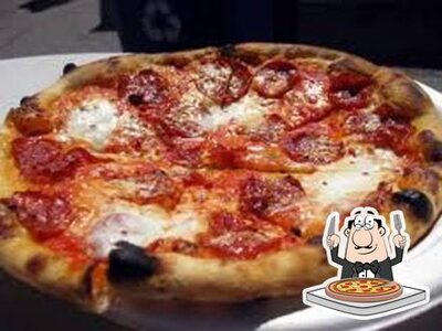 Prenditi una pizza alla pizzeria Pizza Taxi