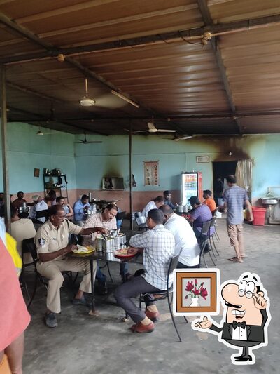 Take a seat at one of the tables at Nellore Mess