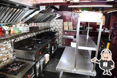 Take a seat at one of the tables at 99 Street Food Junction