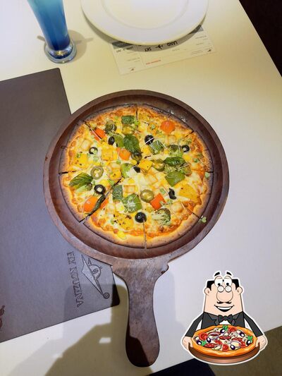 At Fly Kouzina, you can taste pizza