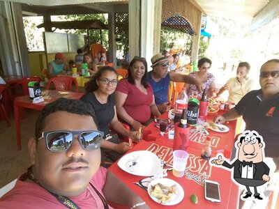 Sente em uma das mesas no Pesqueiro Águas Claras