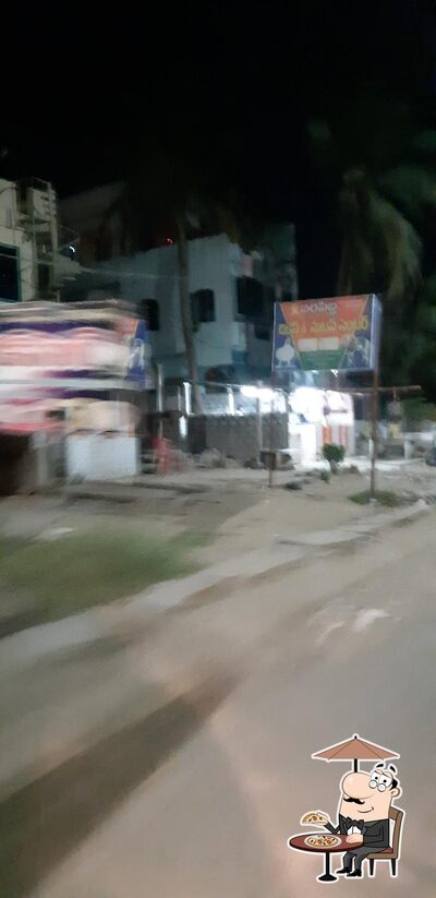 You can get some fresh air outside Varasiddi Chicken & Mutton Centre