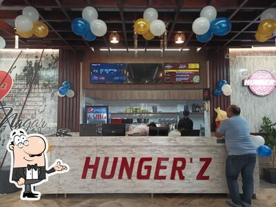 Take a seat at one of the tables at Hunger'z