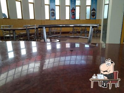 Take a seat at one of the tables at Tula's Cafe