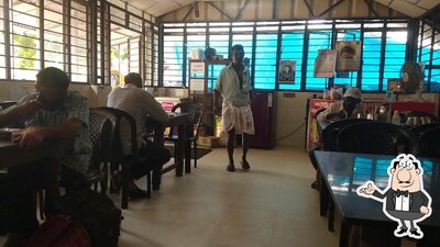 Take a seat at one of the tables at Police Canteen (PCK Restuarant)