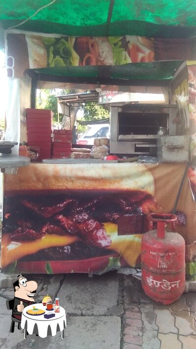 Try out a burger at Pizza Dot Point