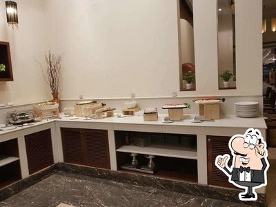 Check out how Cafe 55 - Park Inn looks inside