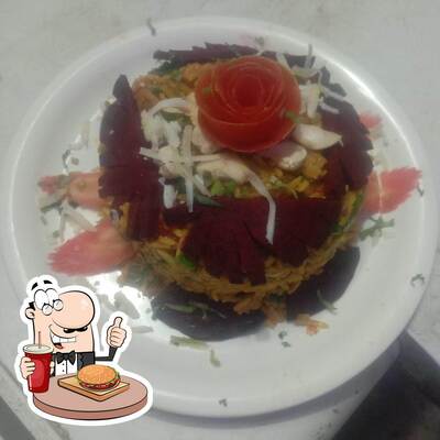 Get a burger at RADHA RANI RESTAURANT