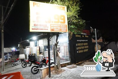 O exterior do Pizzaria guto express delivery