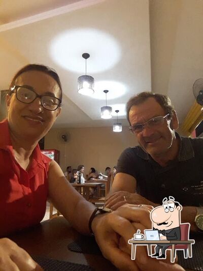 Veja imagens do interior do Pizzaria e Esfiharia a