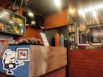 Take a seat at one of the tables at Dosel Cafe