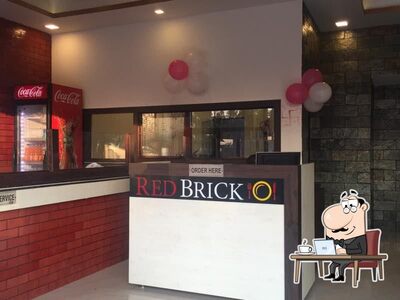 Take a seat at one of the tables at Red Brick Restaurant