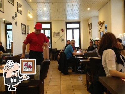 Siediti a un tavolo di Joe's American Pizza