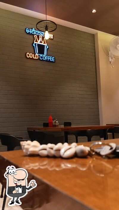 Take a seat at one of the tables at The Retro Cafe