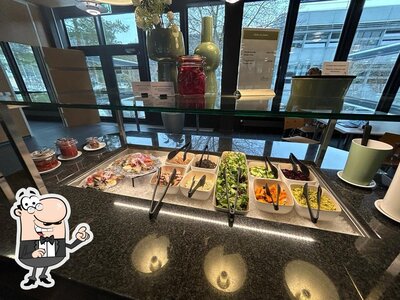 Installez-vous à l'une des tables de Die Gourmet-Terrasse