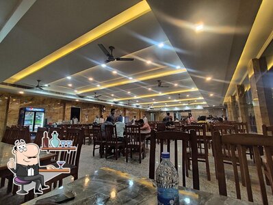 Take a seat at one of the tables at Khaira punjabi dhaba